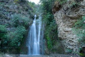 Aharbal waterfall cascading down rocks